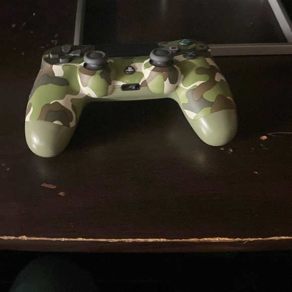 PS4 with controllers and games